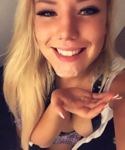 Beautiful blonde taking a selfie after a facial