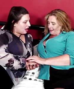 Mature busty lesbos feeding their pussies