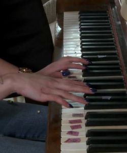 Piano Teacher Hits The Right Notes.