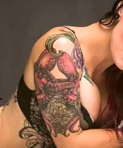 Pretty Brunette Who Seems To Take Her Ink Seriously.